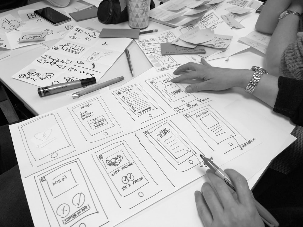 Wireframe sketches on a desk